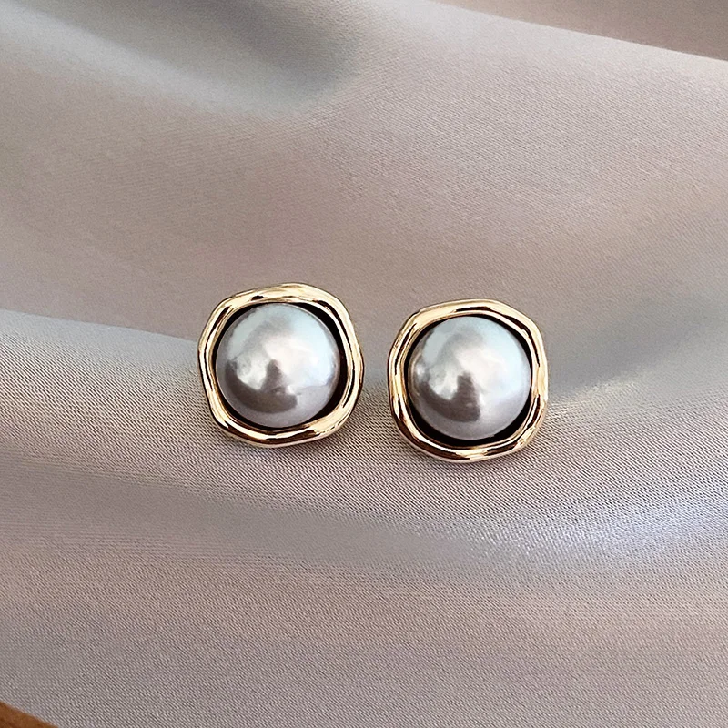 Eleganti melno pērlju auskari